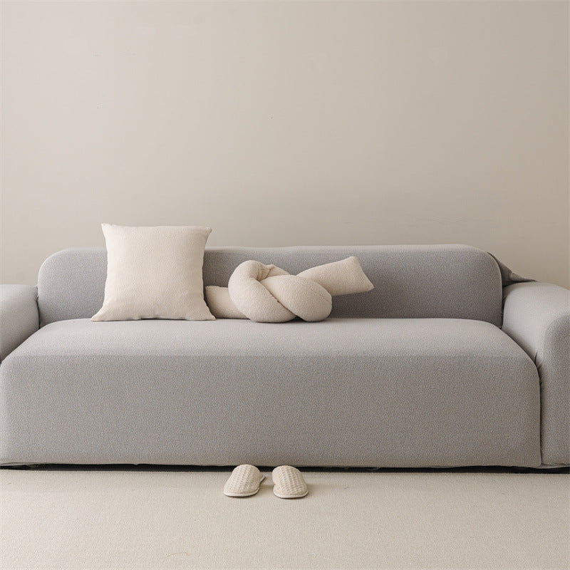 Housse de canapé extensible haut de gamme déperlante texture teddy argent