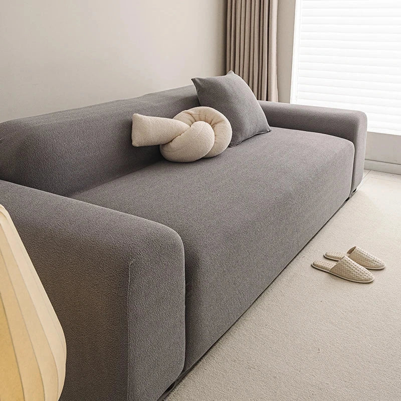 Housse de canapé extensible haut de gamme déperlante teddy gris de profil