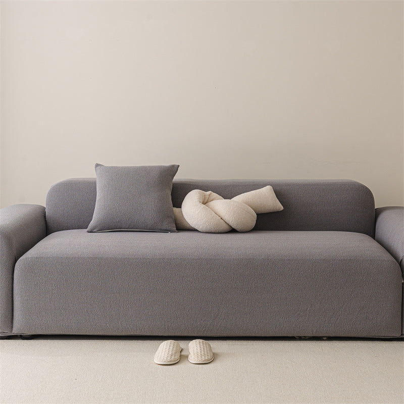 Housse de canapé extensible haut de gamme déperlante texture teddy gris 