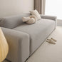 Housse de canapé extensible haut de gamme déperlante texture teddy gris clair