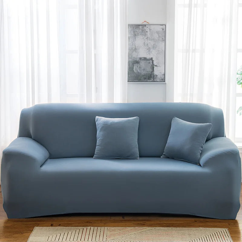 Housses de canapé extensibles couleurs unies