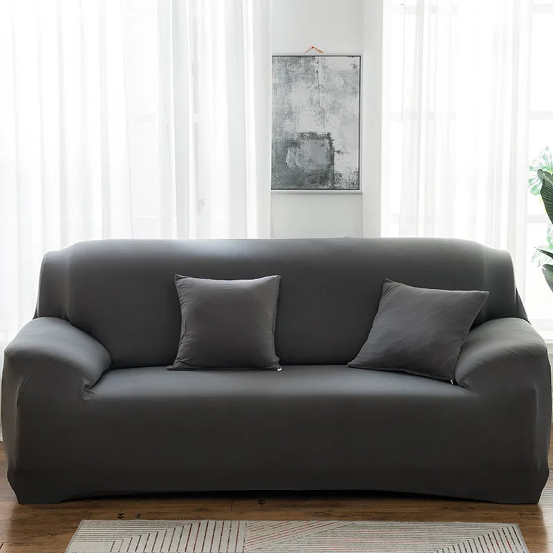 Housses de canapé extensibles couleurs unies