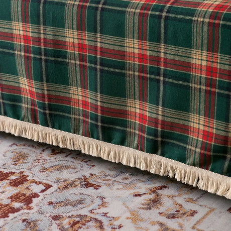 finition du jeté de canapé écossais